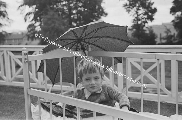 LOURDES HOSPITAL CHILD WITH PARASOL  PADDY GARVEY  20 ST MARYS TERRACE